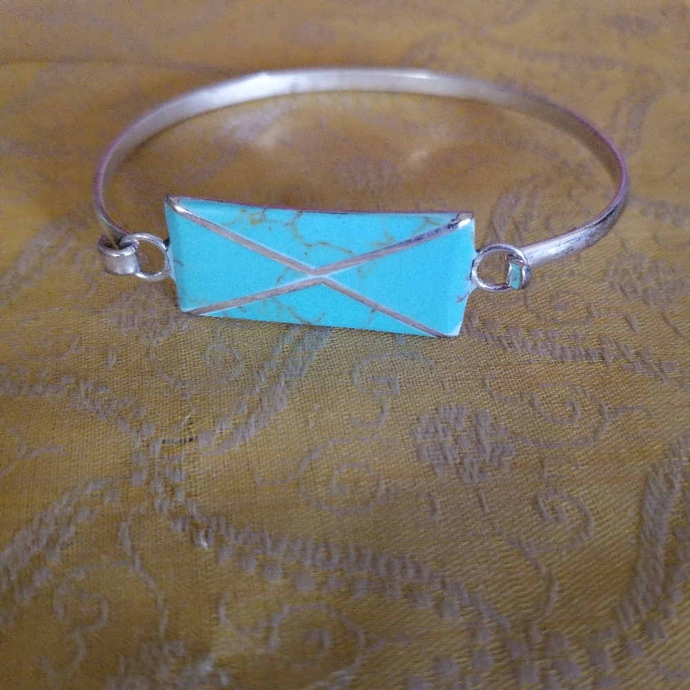 Silver and turquoise inlaid bracelet.